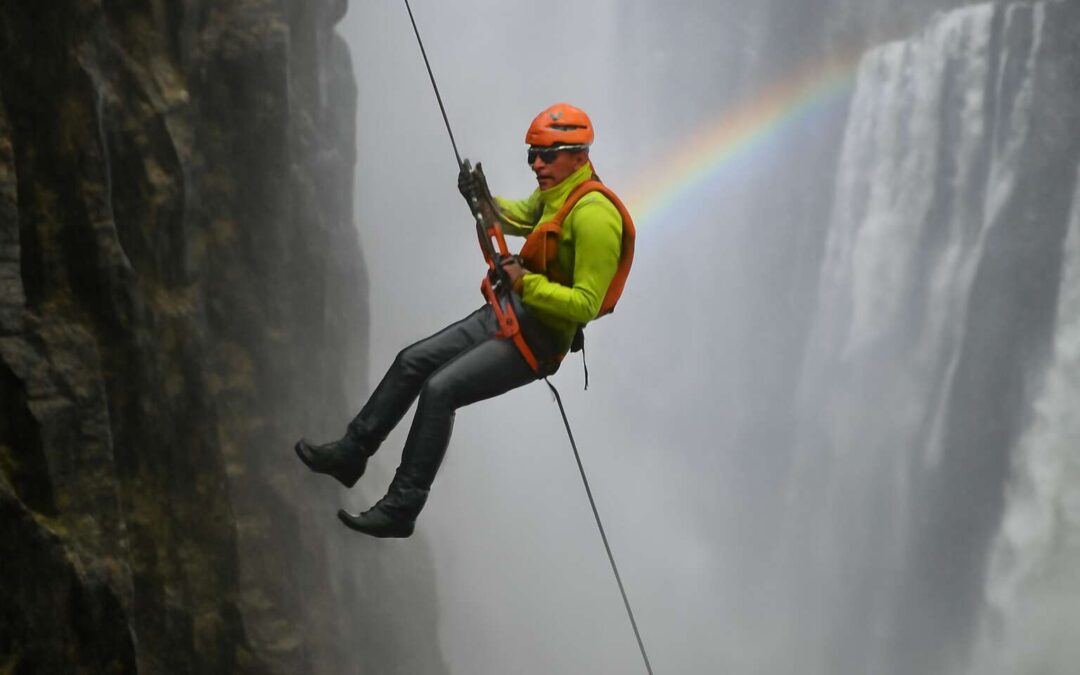 Daredevil abseiling victoria falls: a heart-pounding plunge into cascading mist.